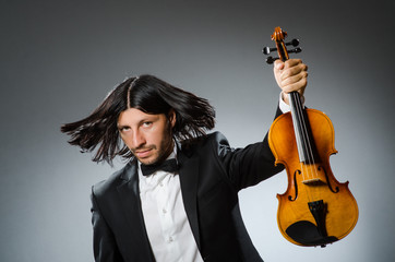 Man violin player in musican concept