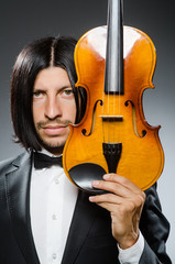 Man violin player in musican concept © Elnur