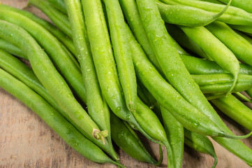 Fresh snap or green beans on a table
