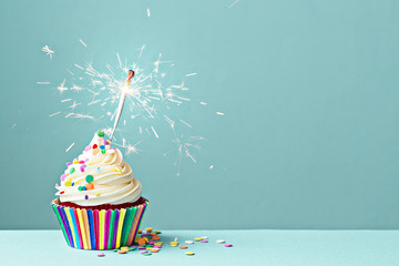 Celebration cupcake with sparkler - Powered by Adobe