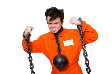 Young inmate with chains isolated on the white
