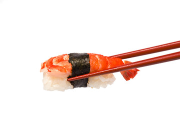 Sushi with Shrimp is held by Chopsticks isolated on white