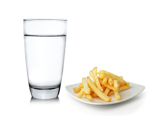 Glass of water and French fries isolated on white background