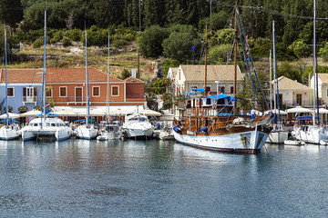 Fototapeta na wymiar Boats in Fiscardo village in Kefalonia island, Greece