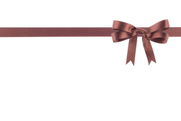 Brown ribbon with a bow on  white background