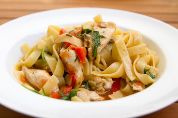 tagliatelle with chicken, vegetable and rucola