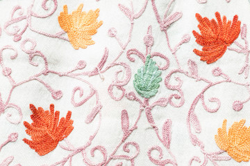 Fabric with orange leaves
