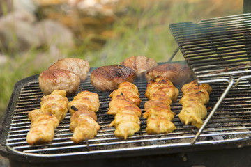 Grilled pork meat and meetballs