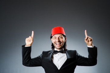 Man in traditional turkish hat and dress