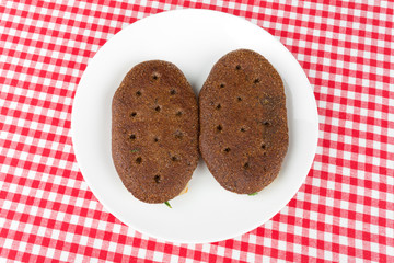 Two rye flatbred on a plate