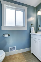 Bright bathroom in light blue