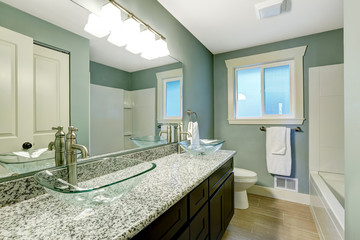 Modern bathroom interior in soft aqua color