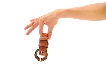 Hand hold orange belt roll for woman