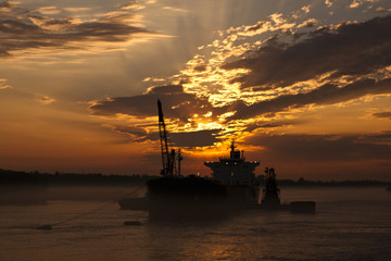 Cargo ship at anchor on mississippi river