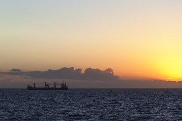 Fototapeta na wymiar Cargo ship silhouette