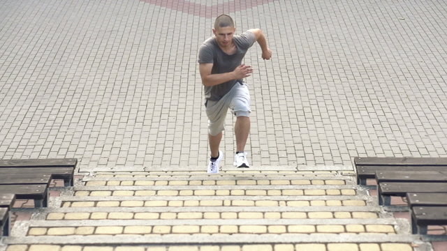 Man running up the stairs, super slow motion, 240fps
