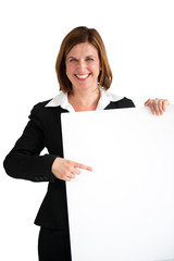 Naklejka premium businesswoman pointing blank white board isolated
