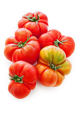 fresh tomatoes over white background.