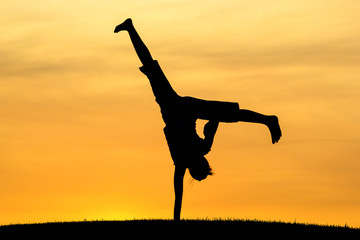 Cartwheel with one hand.
