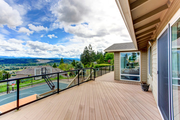 Walkout deck with backyard view