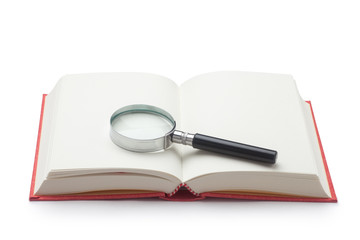 magnifying glass and book