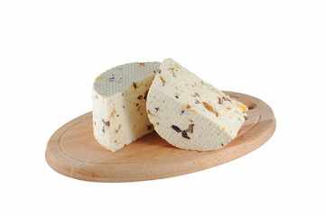 Cheese with prunes and dried apricots isolated on white