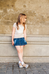 Outdoor portrait of a cute little girl
