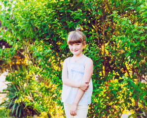 Outdoor portrait of a cute little girl