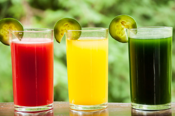 Colorful glasses of fruit and vegetable juice