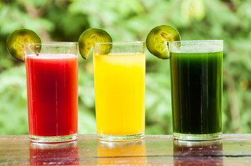 Colorful glasses of fruit and vegetable juice