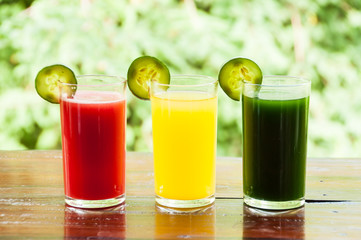 Colorful glasses of fruit and vegetable juice
