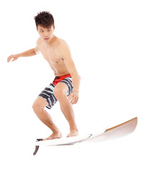 professional young surfer practice surfing pose