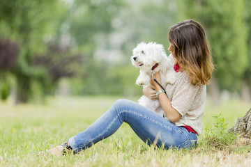 Fototapeta premium Young woman with a dog
