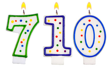 candles number seven hundred ten isolated on white background