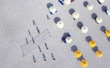 People playing beach volley at the beach of Kallithea, one of th