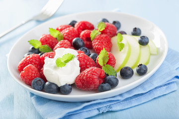 fresh fruit salad with raspberry blueberry apple