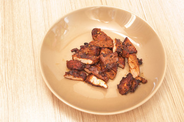 Roast beef with black pepper on the plate