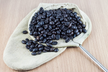 Roasted coffee beans in a bag