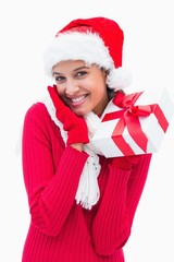 Beautiful festive woman holding gift