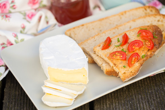 Sliced camembert cheese