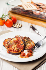 Delicious parmigiana on white plate