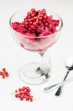 Delicious raspberry sorbet on white background