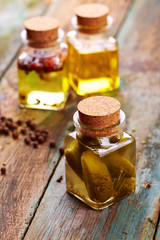 Bottles with spice and cucumber