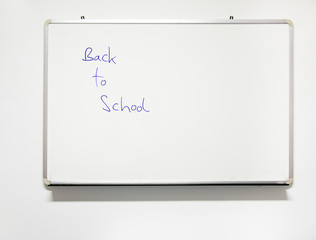 Classroom whiteboard, real writing. Back to school