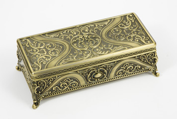 gold casket on a white background