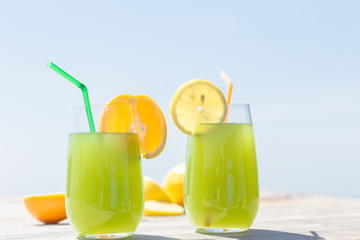 Refreshing fruity juice with the fresh lemon and orange