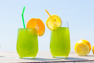 Refreshing fruity juice with the fresh lemon and orange