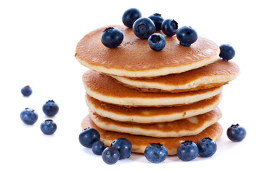 Stack of pancakes with fresh blueberries