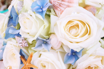 Obraz na płótnie Canvas Beautiful wedding bouquet with sea decor, close up