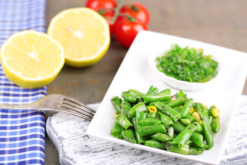 Salad with green beans and corn, and sauce